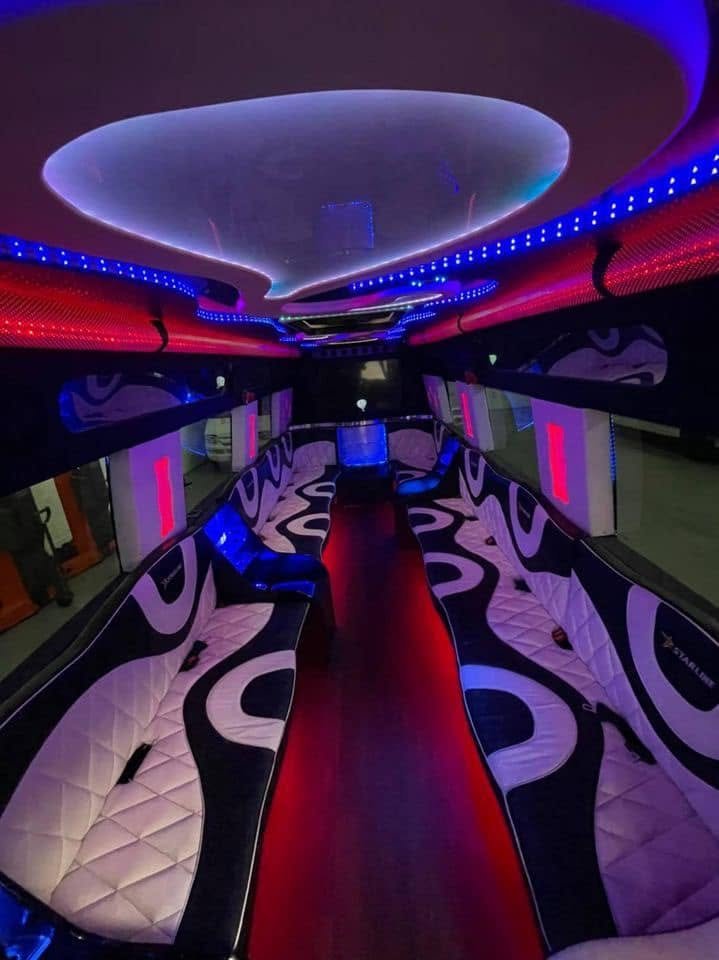 Party van with red floor lights and green LED panels